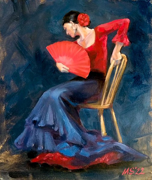 Танцовщица фламенко с красным веером