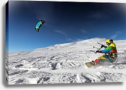 Постер Сноубордист съезжает с парашютом с горы