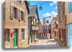 Постер Узкие улицы со старыми традиционными домами в городе Динан, Франция