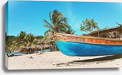 Постер Старая голубая лодка на пляже