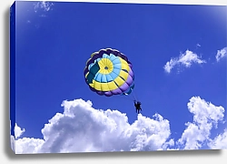 Постер Парашютист на фоне синего неба