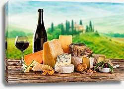 Постер Различные виды сыра на фоне Тосканского пейзажа