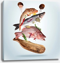 Постер Свежая морская рыба над деревянной доской
