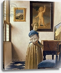 Постер Вермеер Ян (Jan Vermeer) A Young Woman Standing at a Virginal, c.1670-72