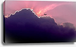 Постер Самолет над розовыми облаками