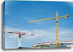 Постер Два строительных крана на фоне неба