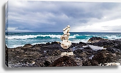 Постер Стопка камней на морском берегу