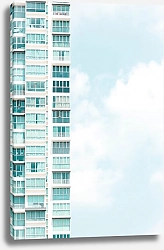 Постер Угол многоэтажного дома на фоне неба