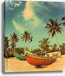 Постер Старые рыбацкие лодки на пляже Индии