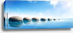Постер Круглые камни в голубой воде