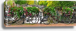 Постер Голландия, Амстердам. Панорама с велосипедами и цветами