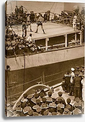 Постер Школа: Английская 20в. Boxing competition aboard a warship, with the crew of a second ship as additional spectators, 1914-19