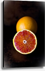 Постер Разрезанный красный апельсин