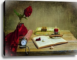 Постер Натюрморт с красной розой и книгой на деревянном столе