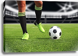 Постер Футболист и мяч на поле стадиона