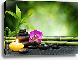 Постер Purple orchid, candle, with stones , bamboo on black mat