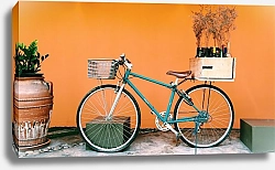 Постер Велосипед у оранжевой стены