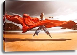 Постер Женщина на пляже в струящейся красной ткани