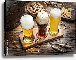 Постер Три бокала пива разных сортов и арахис