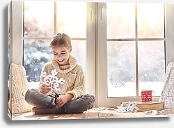 Постер Девочка на окне делает бумажные снежинки