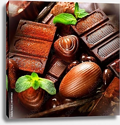 Постер Шоколад и конфеты, присыпанные корицей с листочками мяты