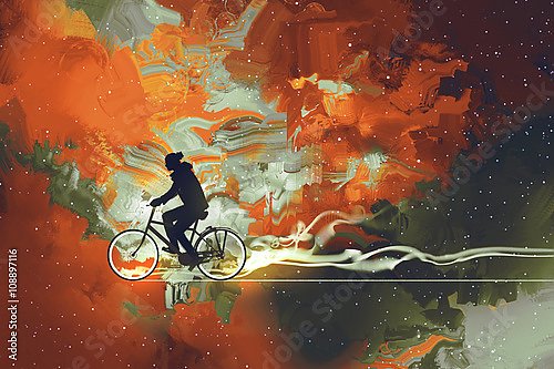 Силуэт человека на велосипеде на фоне звездного неба