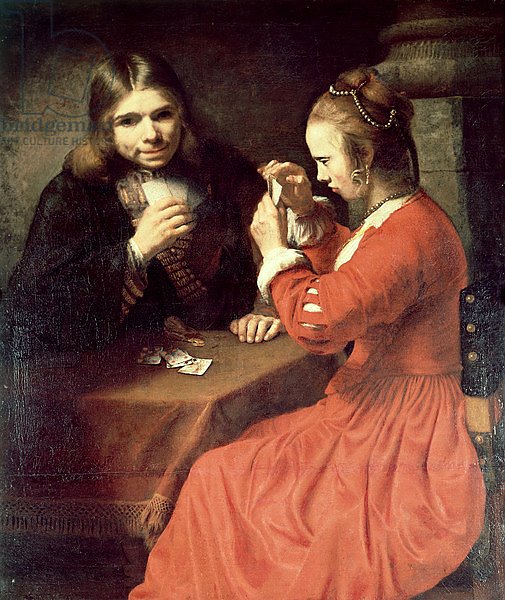 A Young Man and a Girl Playing Cards