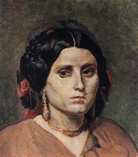 Голова молодой женщины с серьгами и ожерельем.