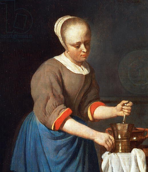 Young girl with a pestle and mortar