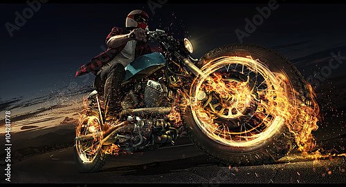 На мотоцикле с огненными колёсами