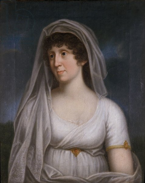Women in a white dress with a veil