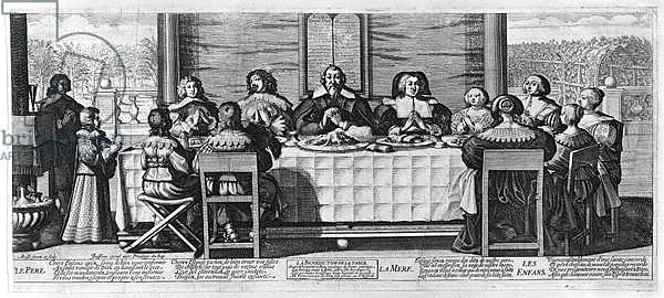 A Protestant family blessing the meal