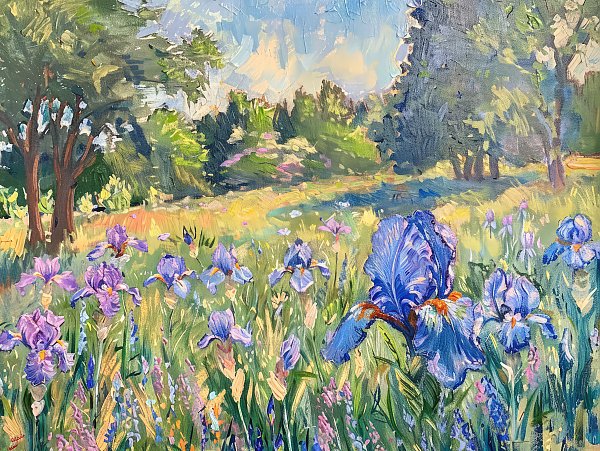 Irises on the forest background