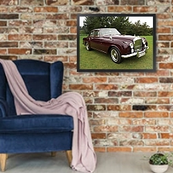 «Bentley S2 Continental Coupe by Mulliner '1960–62» в интерьере в стиле лофт с кирпичной стеной и синим креслом