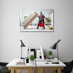 «Супергерой-уборщик пылесосит пол» в интерьере современного офиса над столами работников