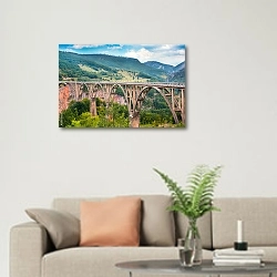 «Черногория. Мост Джурджевича» в интерьере современной светлой гостиной над диваном