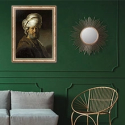 «Man in Oriental Dress, 1635» в интерьере классической гостиной с зеленой стеной над диваном