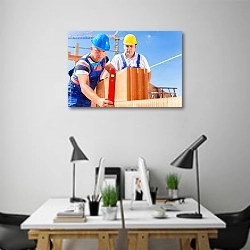 «Рабочие на строительстве кирпичного здания» в интерьере современного офиса над столами работников