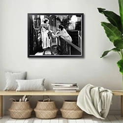 «Гарбо Грета 147» в интерьере комнаты в стиле ретро с плетеными корзинами