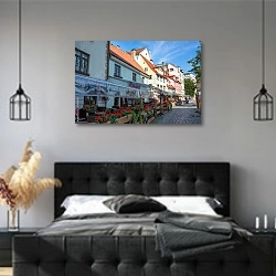 «Латвия, Рига. Улица с цветами в центре города» в интерьере современной спальни с черной кроватью
