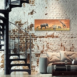 «Животные саванны» в интерьере двухярусной гостиной в стиле лофт с кирпичной стеной