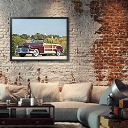 «Chrysler Town&Country Convertible '1946» в интерьере гостиной в стиле лофт с кирпичной стеной
