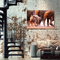 «Стадо бегущих слонов» в интерьере двухярусной гостиной в стиле лофт с кирпичной стеной