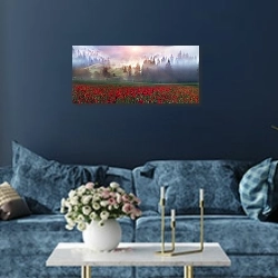 «Поле маков в Карпатах» в интерьере стильной синей гостиной над диваном