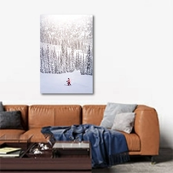 «Лыжница в снежном лесу» в интерьере современной гостиной над диваном