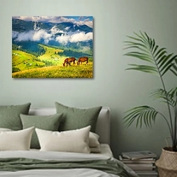 «Удивительный горный пейзаж с туманом и лошадьми» в интерьере современной спальни в зеленых тонах