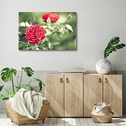 «Куст красных роз» в интерьере современной комнаты над комодом