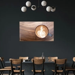 «Top view of hot coffee latte art on wooden table» в интерьере столовой с черными стенами