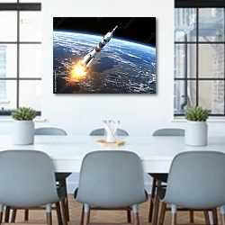 «Ракета-носитель» в интерьере офиса над столом для конференций