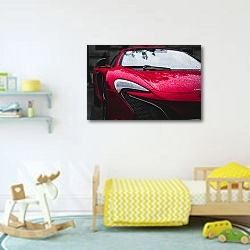 «Красный спортивный автомобиль в каплях» в интерьере детской комнаты для мальчика с игрушками